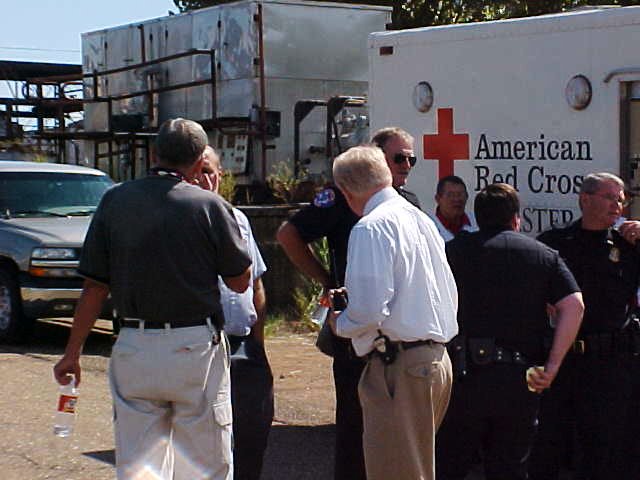 Police personnel planning their next move for the man hunt.